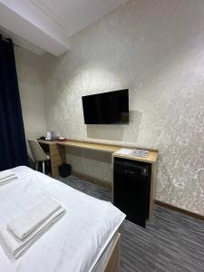 TV a/nebo společenská místnost v ubytování Tahtapul Expo Hotel