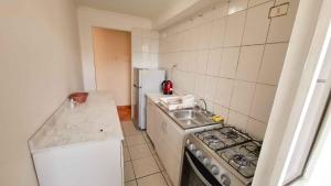 Kuchyň nebo kuchyňský kout v ubytování D11-4 Depto diario Arica