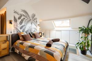 Postel nebo postele na pokoji v ubytování Le Loft, chic et cozy