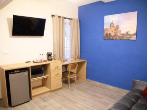 TV a/nebo společenská místnost v ubytování Privada Guadalupe