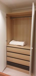 a walk in closet with a bed in it at Tromsø, Skarvegen 18, two bedrooms in Tromsø