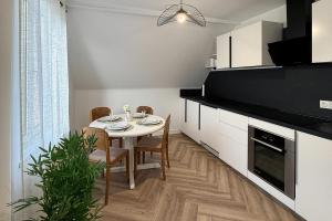 Η κουζίνα ή μικρή κουζίνα στο Le Cosy - Paisible - Confort - Parking