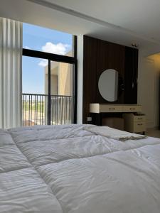 Ένα ή περισσότερα κρεβάτια σε δωμάτιο στο The Chiefs Villa