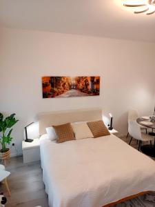 Ένα ή περισσότερα κρεβάτια σε δωμάτιο στο Family Apartment Neunkirchen 2