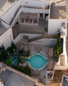 Bazén v ubytování Palazzo Flora nebo v jeho okolí + 12 fotografií