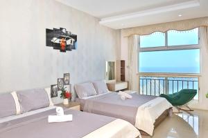 Ένα ή περισσότερα κρεβάτια σε δωμάτιο στο Căn hộ OASKY ngay Tháp Tam Thắng +45 φωτογραφίες