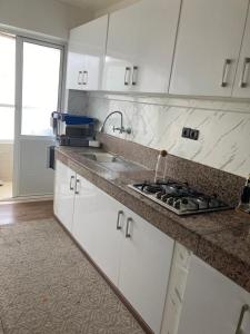 Kuchyň nebo kuchyňský kout v ubytování CasaBasma