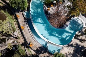 an overhead view of a water slide at a water park at ROTUI CABAÑA EXCLUSIVA DON FERMIN in San Martín de los Andes