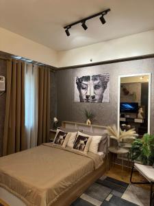 Postel nebo postele na pokoji v ubytování Meraki Stays - ISLA - SMDC Hope Residences