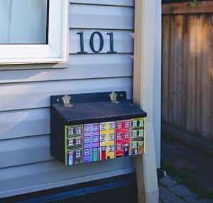 a box sitting on the side of a house at Private Boho Brampton Stay-Pets OK & Walk to GO in Brampton