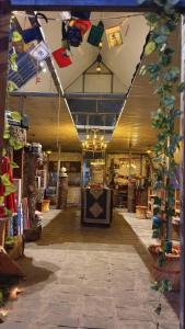 an inside view of a store with a room with at The shire kalga in Kasol