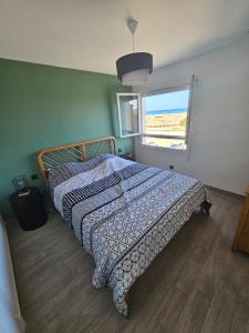 Ένα ή περισσότερα κρεβάτια σε δωμάτιο στο La perle rare +7 φωτογραφίες