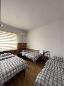 Postel nebo postele na pokoji v ubytování hotel floreale