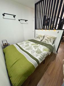 Postel nebo postele na pokoji v ubytování L'Escapade Urbaine