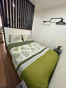 Postel nebo postele na pokoji v ubytování L'Escapade Urbaine