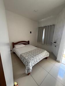 Ένα ή περισσότερα κρεβάτια σε δωμάτιο στο Apartamento mobiliado no Encantos do Natal 2025 Garanhuns PE