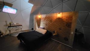 Postel nebo postele na pokoji v ubytování Glamping Jilotepec, Aldea el corazon de la montaña