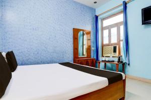 Μια τηλεόραση ή/και κέντρο ψυχαγωγίας στο Hotel O INDRA FUN 'N' FOOD +20 φωτογραφίες