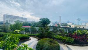 a view of a garden in a city at Manhattan Heights TowerD-Unit5 Viv's room Studio type in Manila