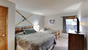 Ένα ή περισσότερα κρεβάτια σε δωμάτιο στο AA302 Buffalo Village