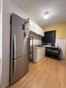 Η κουζίνα ή μικρή κουζίνα στο Homestay Kota Warisan KLIA