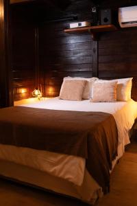 Postel nebo postele na pokoji v ubytování Skydomo