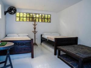 Ένα ή περισσότερα κρεβάτια σε δωμάτιο στο villa campestre las palmas