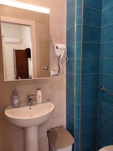 Koupelna v ubytování Aparthotel Napoli Railway