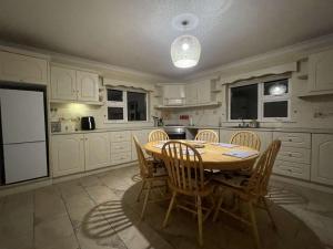 Kuchyň nebo kuchyňský kout v ubytování Nels home + 3 fotografie