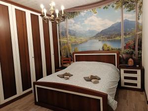 Giường trong phòng chung tại Villa Varano Borghi - Lake