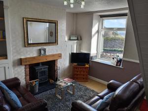 TV a/nebo společenská místnost v ubytování Copper Mine Cottage