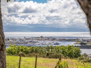 a view of a city and a body of water at Seaborne Cottage - Pwlheli in Pwllheli
