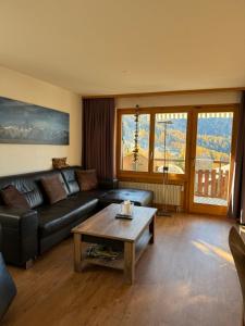 Posezení v ubytování Maisonette Wohnung mit Bergsicht