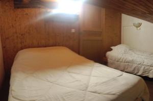 Ένα ή περισσότερα κρεβάτια σε δωμάτιο στο Appartement 3 Chambres