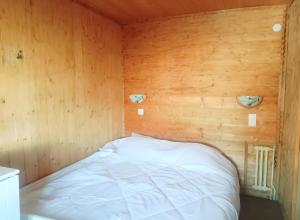 Ένα ή περισσότερα κρεβάτια σε δωμάτιο στο Appartement 3 Chambres +2 φωτογραφίες