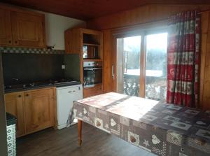 Η κουζίνα ή μικρή κουζίνα στο Appartement 3 Chambres