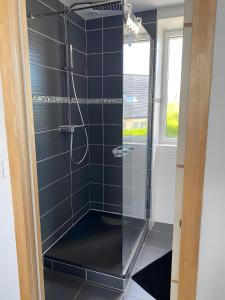 Koupelna v ubytování Ker Helo-ana + 22 fotografií