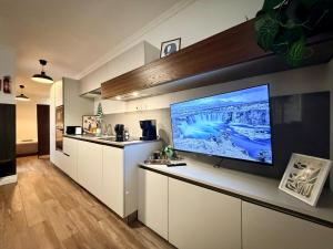 Η κουζίνα ή μικρή κουζίνα στο Stylish Maisonette off the Seafront