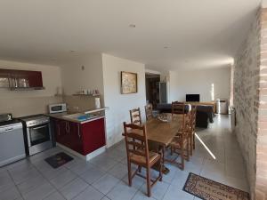 Køkken eller tekøkken på Le Gîte Du Vieux Mûrier Côté Sud