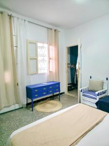 Ένα ή περισσότερα κρεβάτια σε δωμάτιο στο Les Sables Bleus