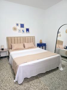 Ένα ή περισσότερα κρεβάτια σε δωμάτιο στο Les Sables Bleus