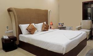 Postel nebo postele na pokoji v ubytování Hotel Laffaire by Welcome Palace + 24 fotografií