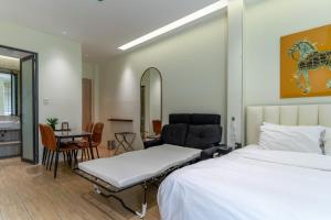 Ένα ή περισσότερα κρεβάτια σε δωμάτιο στο The Rixx Saigon Central - Next to Ben Thanh Market