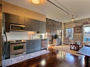 Kuchyň nebo kuchyňský kout v ubytování Soho Suite