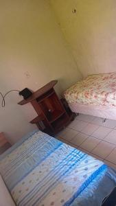 Ένα ή περισσότερα κρεβάτια σε δωμάτιο στο Casa Soares