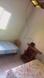 Ένα ή περισσότερα κρεβάτια σε δωμάτιο στο Casa Soares