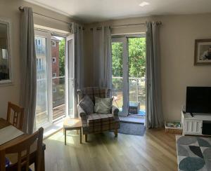 Χώρος καθιστικού στο Stylish apartment sleeps 6