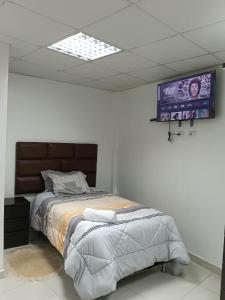 Ένα ή περισσότερα κρεβάτια σε δωμάτιο στο garden & house