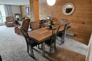 a dining room with a table and chairs at Sugar Baby (B6) in Cedar