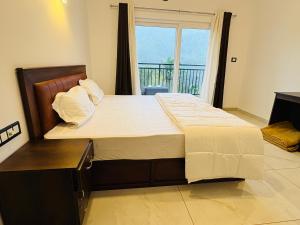 Ένα ή περισσότερα κρεβάτια σε δωμάτιο στο Ann Villa homestay